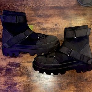 Black Chelsea boots with chunky sole